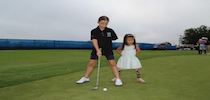 Young Child Amputees Playing Golf